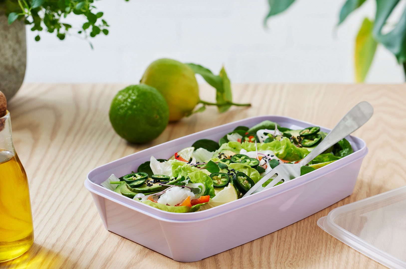 An open SmartStore Easy 1.2-litre food storage container with a portion of salad inside.